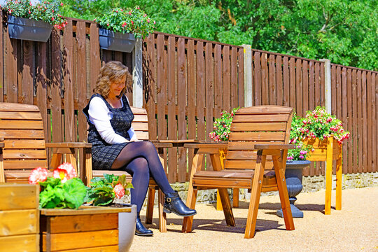 Sitting in the shade in the resin garden.