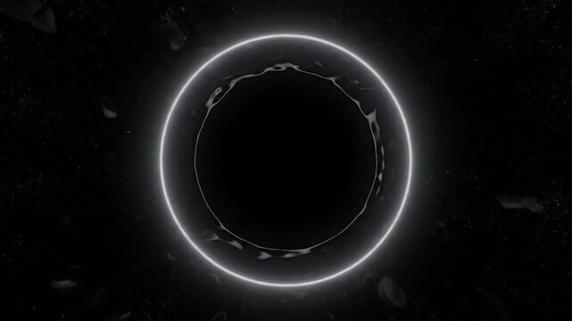 White circular energy shockwave expanding on black background.