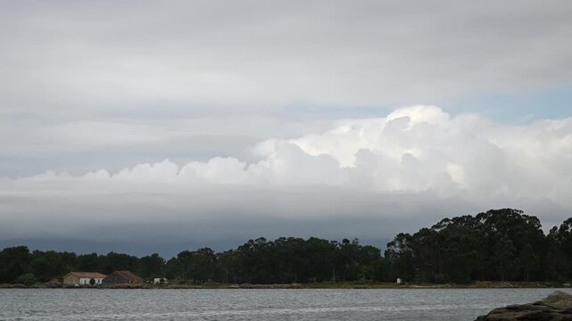Time-Lapse of Cumulus Cloud Formation Above Isla de Arousa and Mussel Rafts in R&iacute;a de Arousa, Galicia, Spain