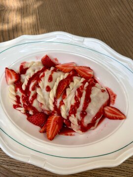 Traditional Sweet Dumplings with Fresh Strawberries and Strawberry Sauce