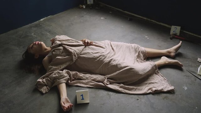 A dead young woman's body lay on the floor of her room, covered with a sheet, with tools used in the crime. But she was not dead. People who have just come back from the dead. She came back to life. 