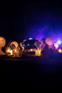 Abstract Miniature of Another Planet with Giant Glowing Mushrooms. A Nighttime Scene on an Alien World, Illuminated by the Soft Glow of Otherworldly Fungi.