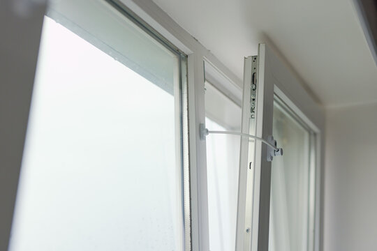 Detailed shot of plastic window limiter child protection lock