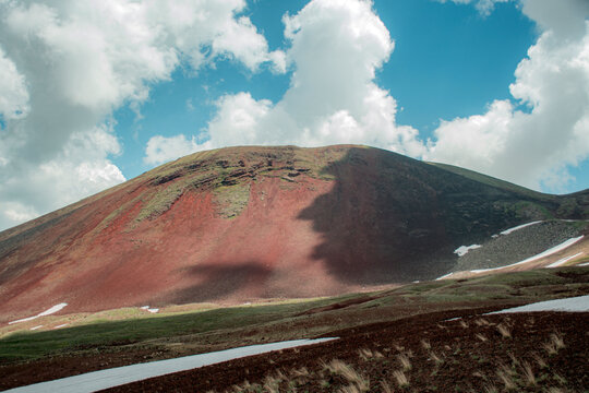 volcano with clouds