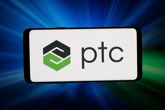 Stuttgart, Germany - 07-15-2026: In this photo illustration, the logo of US software company PTC Inc. is displayed on a smartphone in front of abstract background on computer screen.