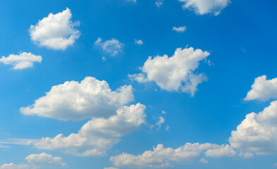 Obraz premium Clear blue sky background with white clouds. Blue sky with cloud.