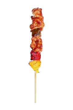 skewer of chicken barbecue with spicy sauce isolated on white.