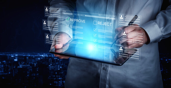 Person Holding Tablet with Digital Approval and Rejection Options in a Dark Cityscape Background, Symbolizing Decision Making and Technology Integration. Bitwise.
