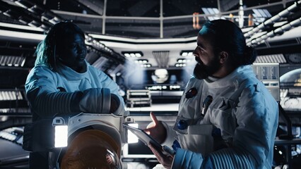 An astronaut crew explores Mars aboard a spacecraft and maps unknown worlds  the team checks mission readiness before landing on the red planet. © DC Studio