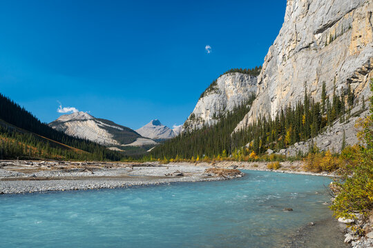 Canadian Rockies Jasper National Park stunning nature scenery. Athabasca River, Rocky mountains in autumn. Alberta, Canada.