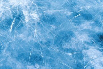 Obraz premium Abstract blue icy surface with fractured lines and cloudy patterns