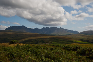 Fototapeta premium Dramatic Cloudscape Over the Cuillin Mountains on the Isle of Skye, Scotland