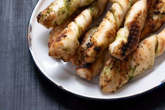 plate of italian garlic pesto pizzetta