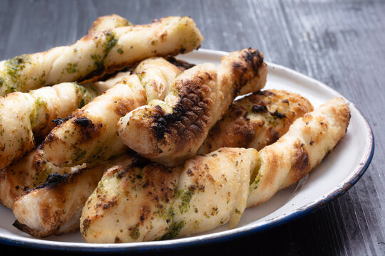 plate of italian garlic pesto pizzetta