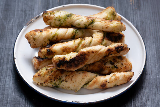 plate of italian garlic pesto pizzetta