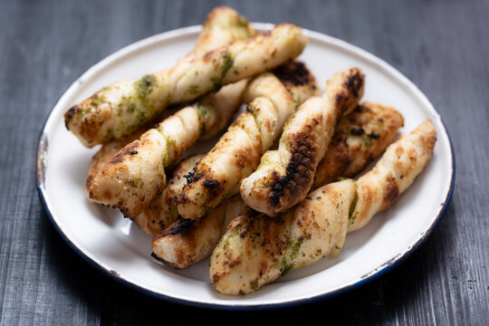 plate of italian garlic pesto pizzetta