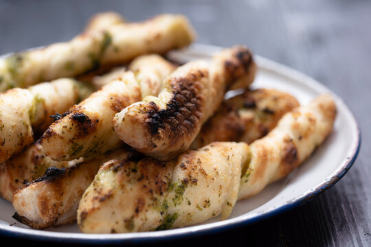 plate of italian garlic pesto pizzetta