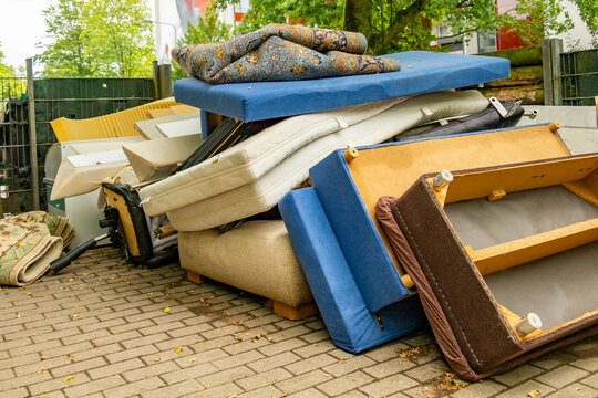 bulky waste reduction, large pile discarded furniture and mattress, Housing change old household items recycling, waste management, end product lifecycle, Divorce separation difficult moving decisions