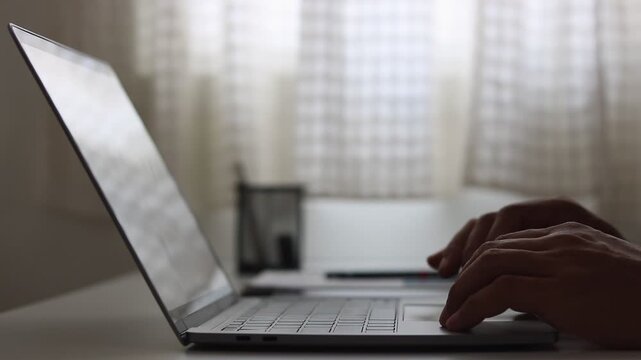 Cybersecurity, Cyber security, Multi factor authentication 2FA login concept. Businessman working on laptop logging in on smartphone and modern device. Secure remote work, banking, online shopping.