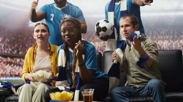 Upset soccer fans react to a tense game on immersive TV broadcast, feeling pitch side as unhappy football supporters watch a dramatic negative match experience.