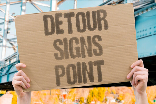 "Detour Signs Point" Navigation markers directed vehicles. DETOUR. SIGNS. DIRECT. TRAFFIC. REPAIR.