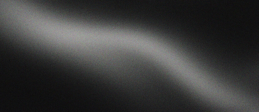 Minimalist black brushed metal texture with soft light reflection, industrial dark steel background for luxury product display, sleek charcoal metallic surface with elegant curved highlight.