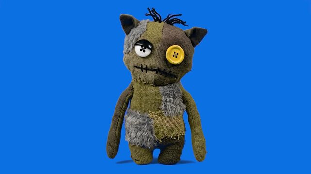 Detailed 3D model of a creepy handmade rag doll monster with button eyes and stitched fabric, isolated on a bright solid blue background. Ideal for Halloween video overlays, horror game assets, spooky