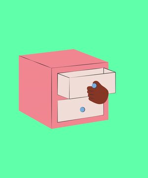 a hand is opening a cupboard