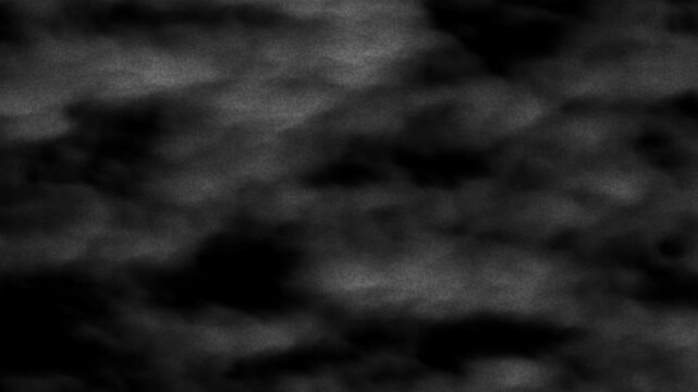 Gray black white blurry wispy foggy cloudy moody abstract texture for backgrounds, overlays, digital design, or adding mystery to projects.