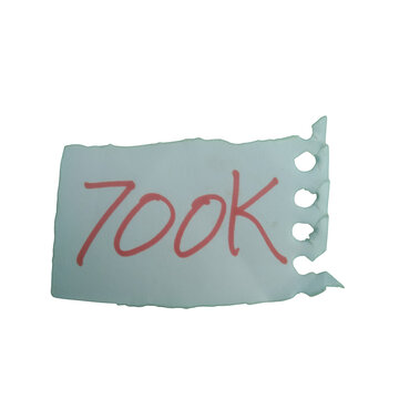 Small torn paper note with handwritten 700k text in red ink isolated on transparent background