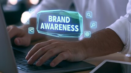 Fototapeta premium Professional businessman working on laptop with holographic awareness icon for digital marketing growth strategy concept.