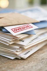 Stack of Overdue Bills and Mail Symbolizing Financial Debt and Stress © Generative AI