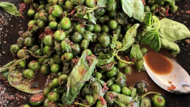 Karedok leunca, a traditional West Javanese dish. Namely (leunca) (black nightshade berries) prepared with a sambal made from chili peppers and other spices.