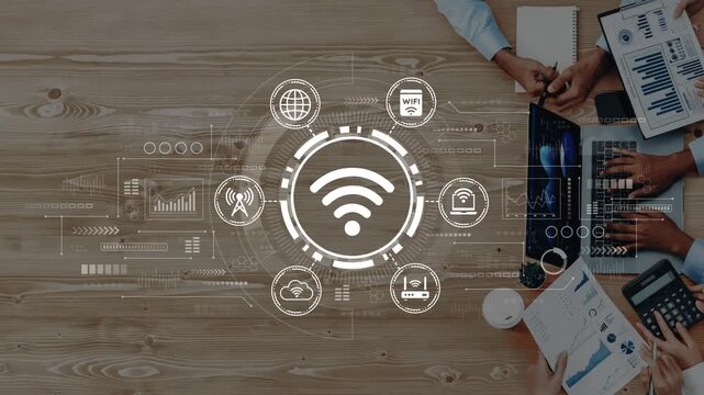 Modern Technology and Connectivity Concept with Wi-Fi Symbol Overlaid on Business Workspace Featuring Laptops and Notebooks. Entropy.