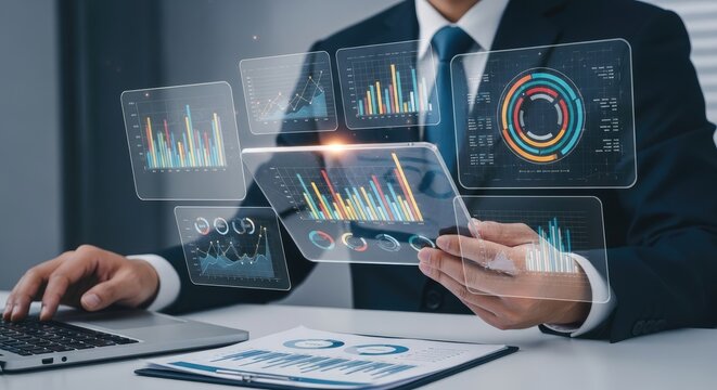 Businessman analyzing data on tablet with virtual graphs and charts suit laptop