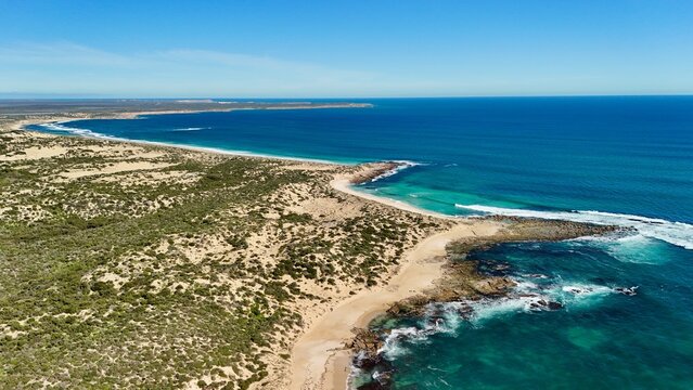 Gym Beach, Marion Bay, South Australia &ndash; 4K aerial drone view of pristine beach, turquoise waters, rocky shoreline, coastal dunes, natutal reserve