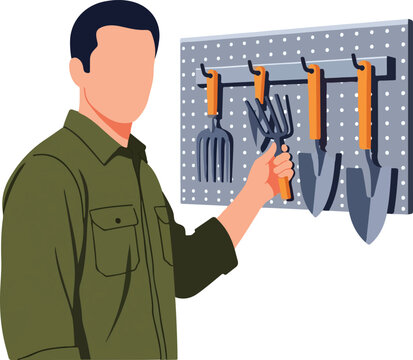 Person organizing gardening tools on wall pegboard in workshop