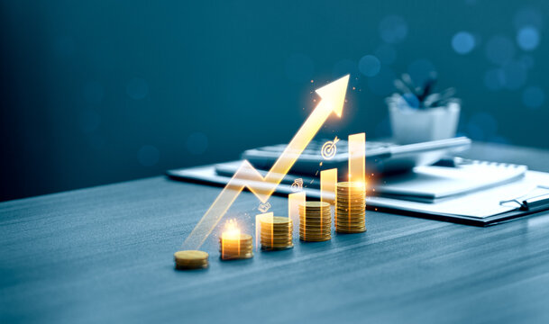 Business financial growth concept with rising arrow chart over coin stacks on office desk showing investment strategy revenue increase profit success and performance analytics