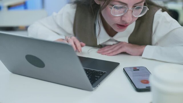 Close-up of Caucasian businesswoman consulting AI agent on smartphone, planning strategy with artificial intelligence assistant, modern technology business lifestyle scene professional
