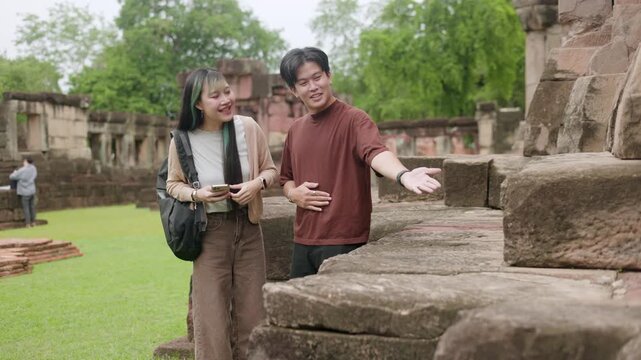 Travelers Checking Map on Tablet at Ruins Part 43