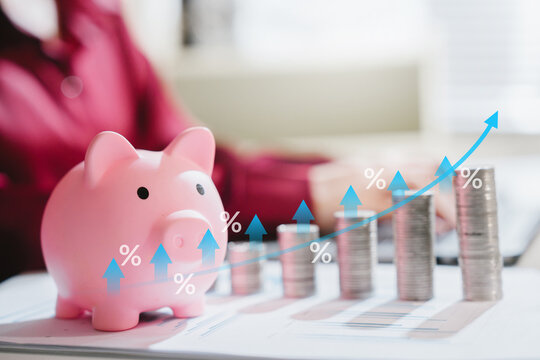 Savings growth concept. Piggy bank and rising coin stacks with percentage arrows represent compound interest, wealth, investment, profit, planning, future