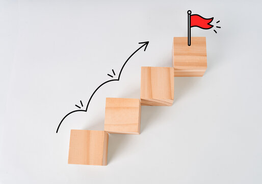 Ascending cubes with a curved arrow leading to a red flag isolated on white background

