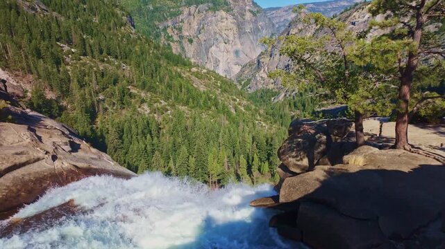 Scenic view from the top of Nevada Fall overlooks the Merced River along Yosemite's Mist Trail