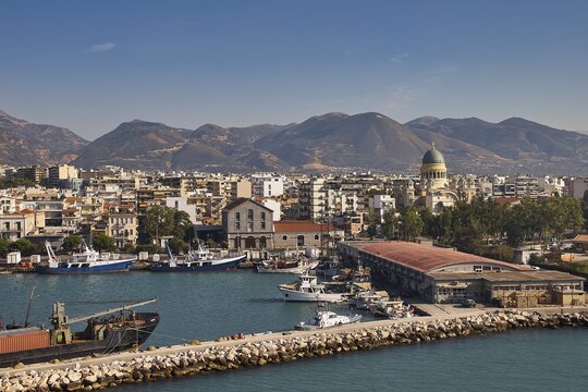 Coastal town with port and ships, surrounded by mountainous landscape, old ferry port in the center of Patras, ferries, Patras, Peloponnese, Greece