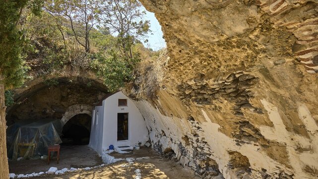 Rustic white structure in a natural cave by daylight, Panagia Thermiani chapel, Pali village, Pali, Volcanic Island, Nisyros, Dodecanese, Greek Islands, Greece