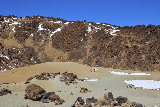 Barren, dry landscape with strips of sand and rocks under blue sky, Teide, Parque Nacional del Teide, Teide National Park, volcano, volcanism, UNESCO World Heritage Site, Tenerife, Canary Islands, Spain