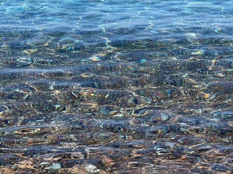 Sea waves on pebble beach