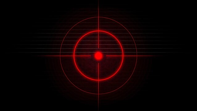 Red laser target reticle with glowing crosshair on dark background