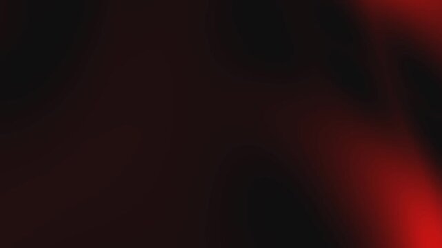 Red film old aesthetic creates a dark blurry abstract soft gradient texture ideal for backgrounds, overlays, designs, and artistic projects.