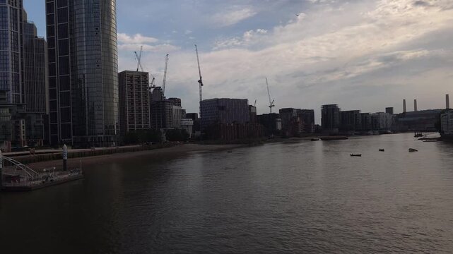 A part of London's skyway on the river Thames near dusk